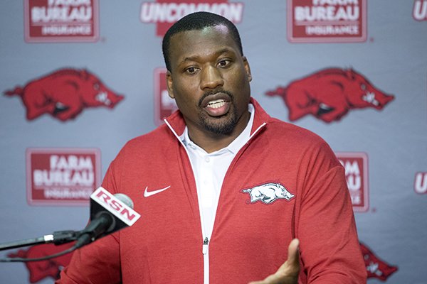 Arkansas assistant coach John Scott speaks with members of the media Tuesday, Feb. 21, 2017, at the Fred W. Smith Football Center on the campus of the University of Arkansas in Fayetteville.