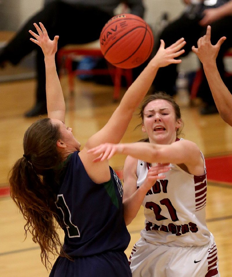 Beebe’s Marianna Richey (21) tries to throw a pass around a Little Rock Christian defender during the Badgers’ 64-53 victory over the Lady Warriors on Tuesday at the 5A-Central Tournament in Maumelle.