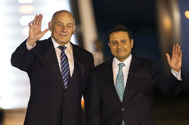 Department of Homeland Security Secretary John Kelly (left) appears Tuesday with Carlos Morales, Guatemala’s foreign minister, at an air base in Guatemala City. Kelly, who is on an official visit to Guatemala, outlined a crackdown on illegal aliens in the United States with a pair of memos released Tuesday.