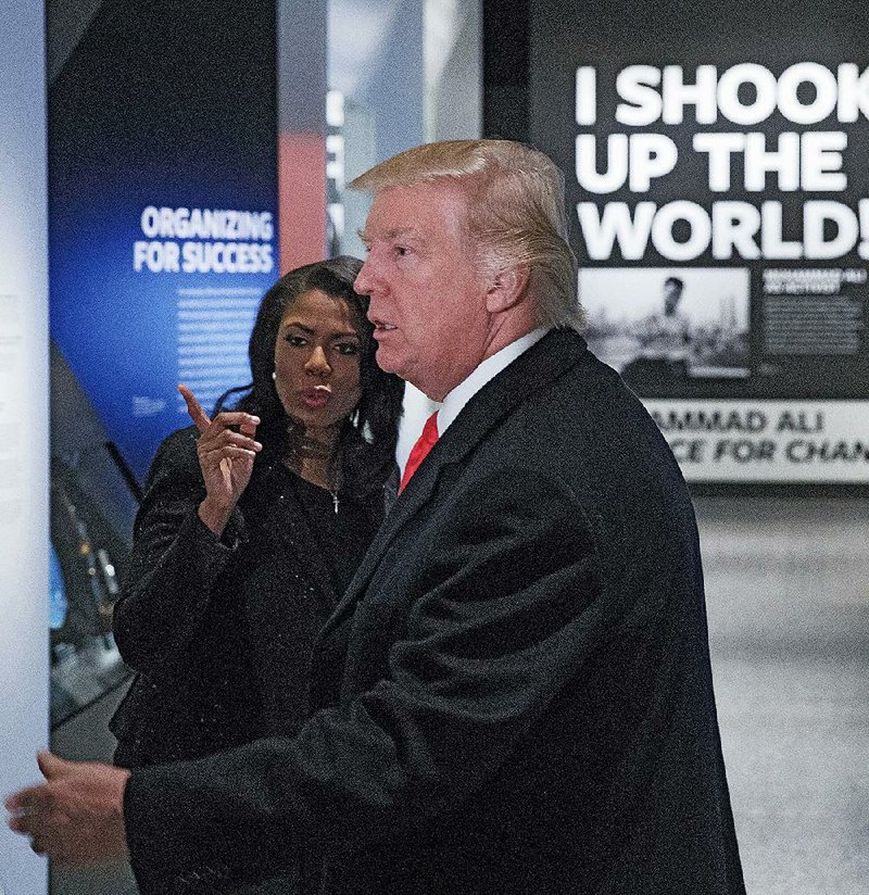 President Donald Trump tours the National Museum of African American History and Culture in Washington on Tuesday. During the visit, he spoke out against the reported increase in anti-Semitism around the country, saying recent threats “are horrible, and are painful, and a very sad reminder of the work that still must be done to root out hate and prejudice and evil.”