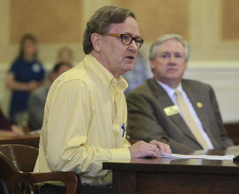 Barry Haas (left), who said he is a longtime poll worker in Pulaski County, speaks against House Bill 1047 on Tuesday in the Senate Judiciary Committee meeting. The bill, sponsored by Rep. Mark Lowery (right), would require voters to provide identification at the polls. The committee approved the bill. 