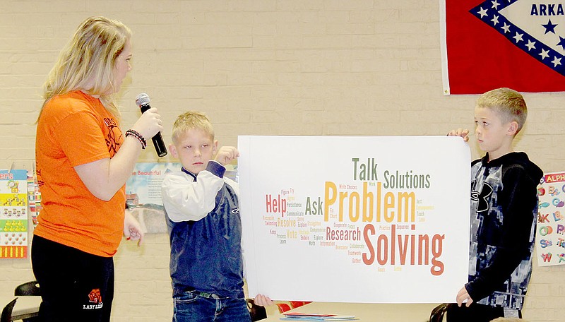 Photo submitted by Zane Vanderpool P.E. Coach Melissa Pittman speaks to students during the Glenn Duffy Elementary PAWS assembly.