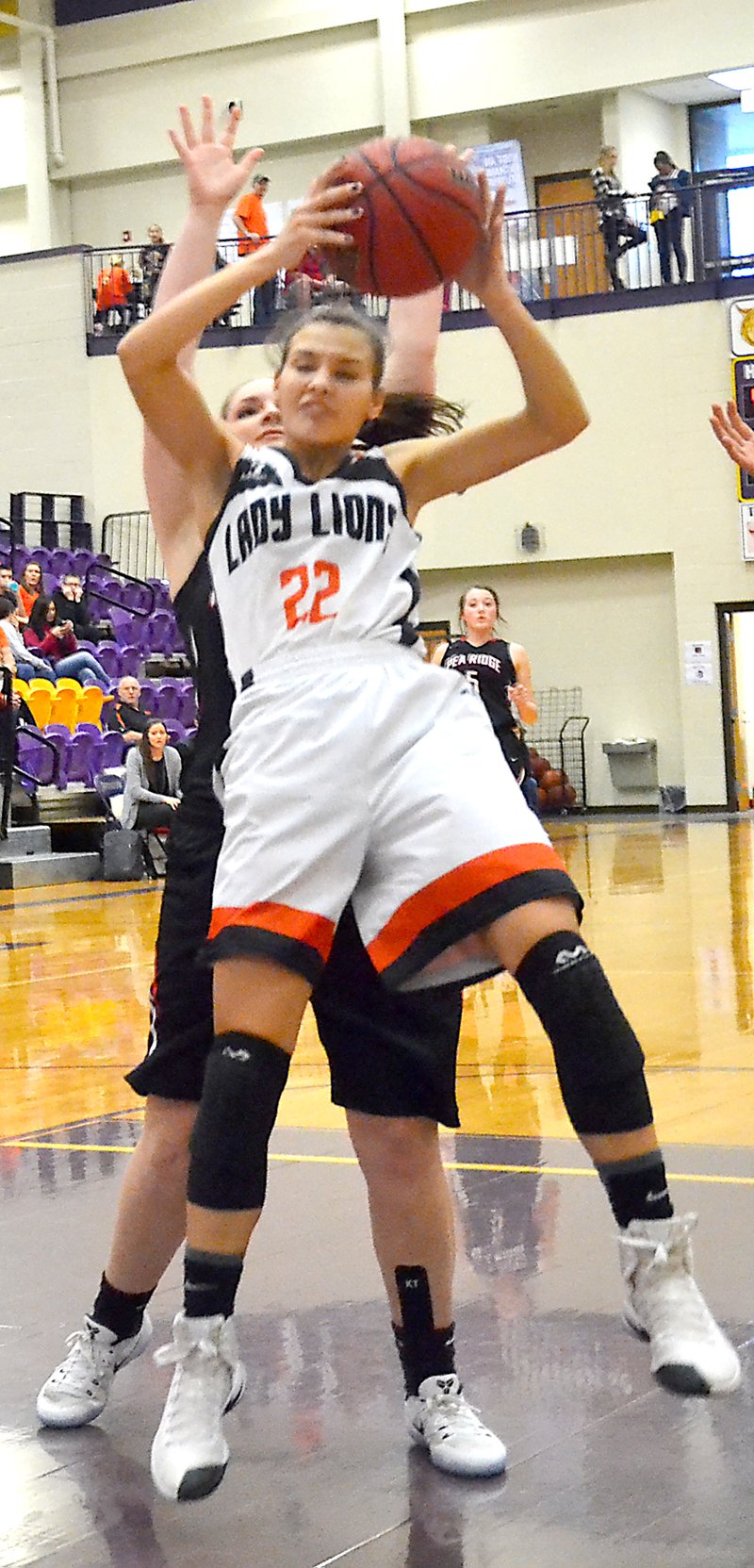 Photo by Annette Beard Gravette&#8217;s Tori Foster grabs a rebound during Saturday&#8217;s consolation game against Pea Ridge in the conference tournament played at Berryville.