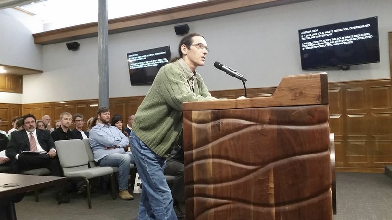 Kelly Mulhollan addresses the City Council on Tuesday at City Hall in Fayetteville. More than 20 residents spoke before the council voted 8-0 to adopt an amended version of its Solid Waste Reduction, Diversion and Recycling Plan.