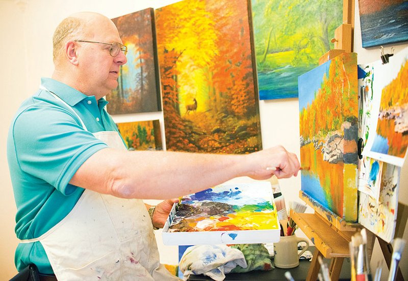 Charles Gilpin of Searcy works on a painting he plans to take to the ninth annual Delta Visual Arts Show on Saturday in Newport. This is the first time he will participate in the show, which will attract more than 180 artists from Arkansas and other states.