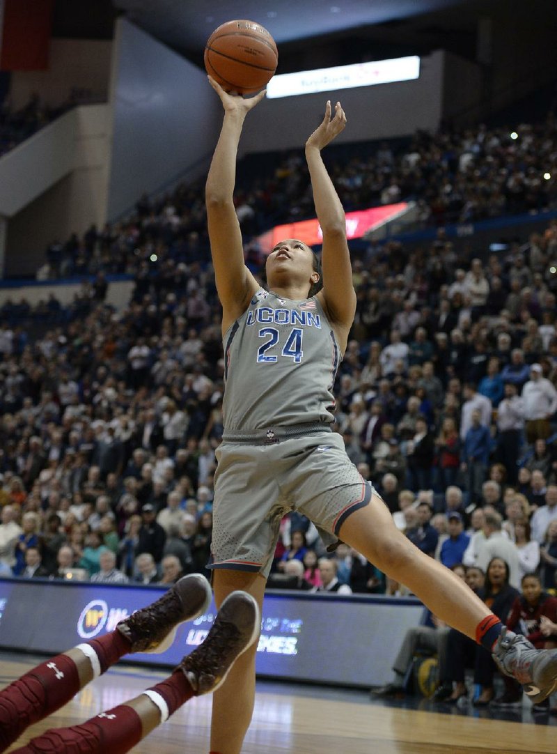 Connecticut forward Napheesa Collier had 31 points, on 13-of-14 shooting, and pulled down 13 rebounds as the Huskies beat Temple 90-45 to run their winning streak to 102 games.