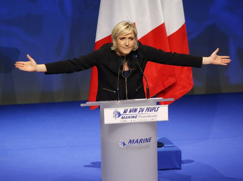Marine Le Pen, the National Front party candidate for the French presidency, speaks earlier this month at a conference in Lyon. Le Pen has said she would like to see France ditch the euro currency and reinstate the franc as the national currency.
