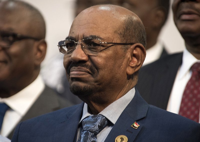 In this June 14, 2015 file photo, Sudanese President Omar al-Bashir smiles during a visit to Johannesburg, South Africa. 