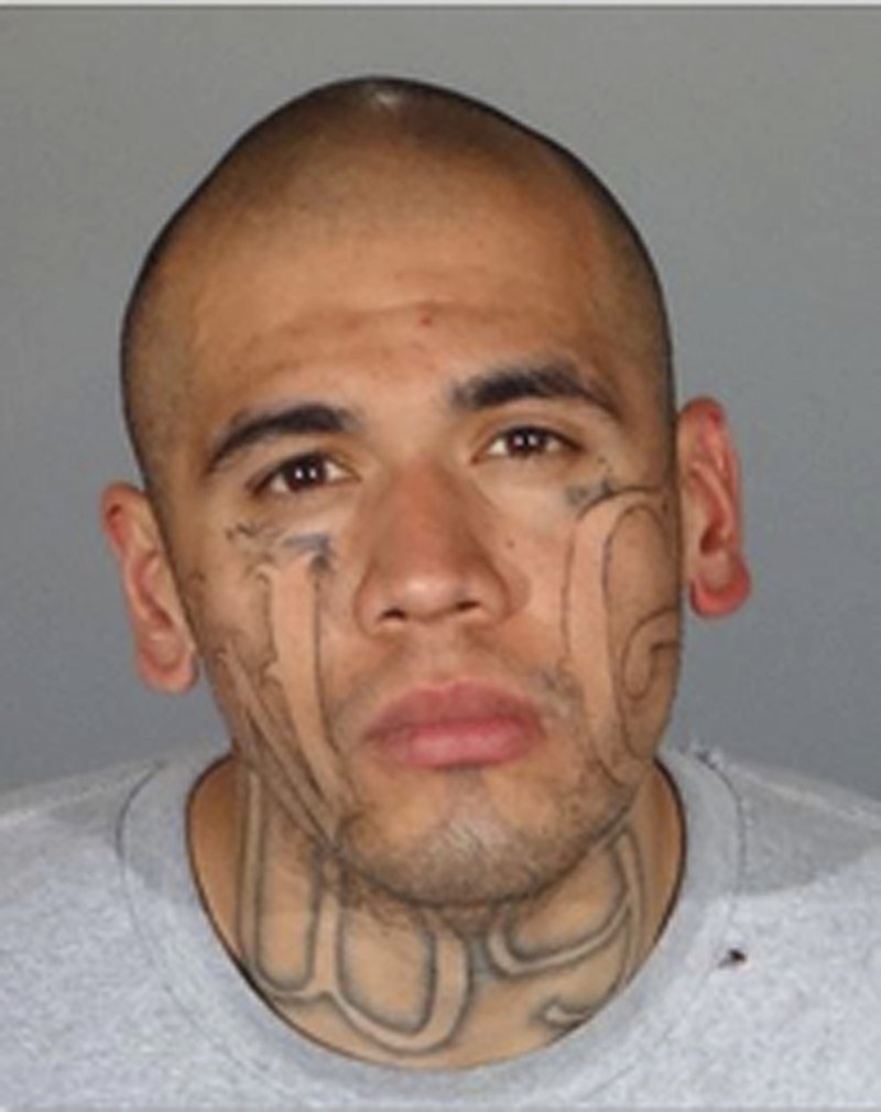 This undated booking photo provided by the Los Angeles County Sheriff's Department shows Michael Christopher Mejia, 26. Authorities have identified Mejia as the suspect they say fatally shot Whittier, Calif., police officer Keith Boyer and injured another as the officers responded to a traffic accident Monday, Feb. 20, 2017. 