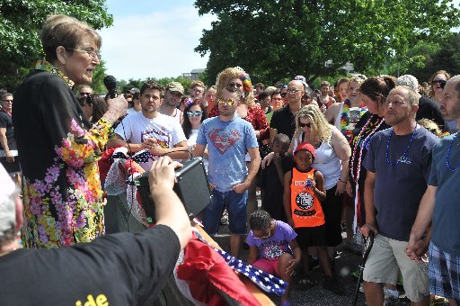 Cheryl Maples, an attorney from Searcy, speaks to gay rights supporters after the annual NWA Pride parade in Fayetteville. Maples has been a supporter of the legal rights of the Arkansas LGBT community.