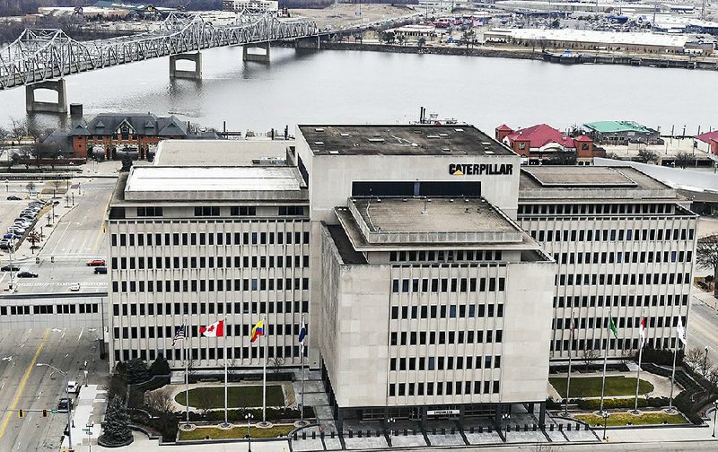 Caterpillar’s global headquarters sits in downtown Peoria, Ill. The company recently decided to move 300 top headquarters jobs to the Chicago area.