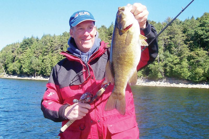 A beautiful bronze color gives the smallmouth bass its common nickname of bronzeback. This nice 
Arkansas smallie was caught by Brad Wiegmann of Springdale.