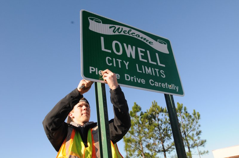 A Lowell city limit sign is shown in this file photo.