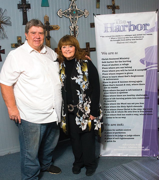 Dana Davin-Ward and her husband, Larry Ward, pastor of The Harbor, stand near the sanctuary of the nondenominational church at 18 Ranchette Road in Conway. The Harbor Home, a residential facility for women with substance abuse, was created inside the church. The couple both teach classes for the residents, and Davin-Ward said the women call the couple Mama D and Papa Bear.