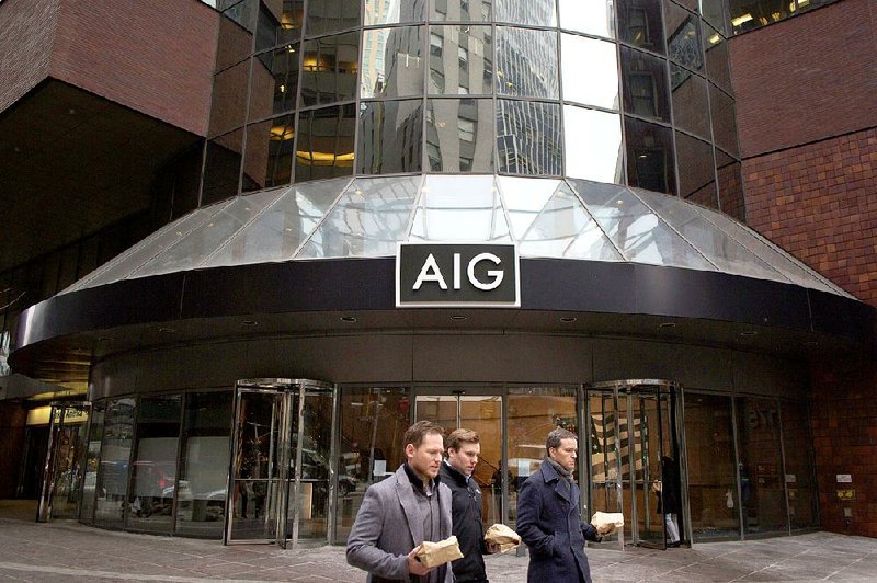AIG has its headquarters in New York, shown in this file photo. In its cutbacks, the insurer has eliminated hundreds of positions in New York and the U.K.