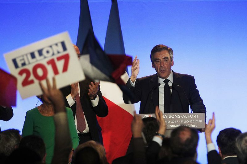 French presidential candidate Francois Fillon delivers a speech at a rally Friday outside Paris.