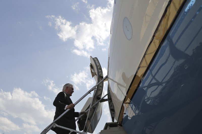 U.S. Secretary of State Rex Tillerson boards a plane to depart at Benito Juarez international Airport in Mexico City, Thursday, Feb. 23, 2017. 