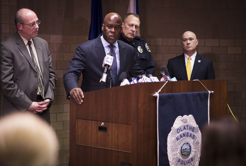 Eric Jackson, FBI Special Agent in Charge, addresses questions from the media during a press conference Thursday, Feb. 23, 2017 at the Olathe Police Department in Olathe, Kan. looking on, from left, Steve Howe, Johnson County District Attorney, Olathe Police Chief Steve Menke and Tom Beall, U.S. Attorney for District of Kansas. 