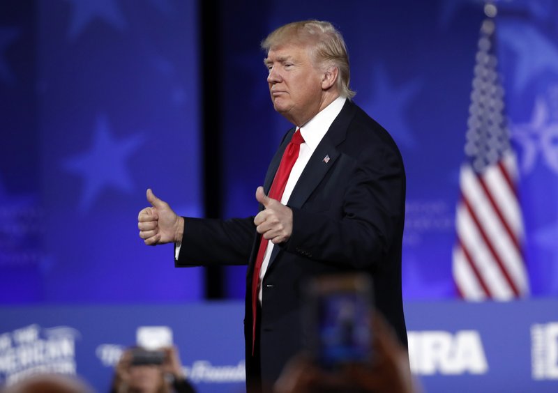 President Donald Trump leaves the stage Friday at the Conservative Political Action Conference in Oxon Hill, Md., where his speech reminisced on his campaign.