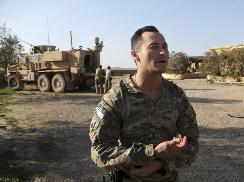 In this Thursday, Feb. 23, 2017 photo, U.S. Army Lt. Col. James Browning speaks during an interview with The Associated Press on a joint base with the Iraqi army south of Mosul, Iraq.