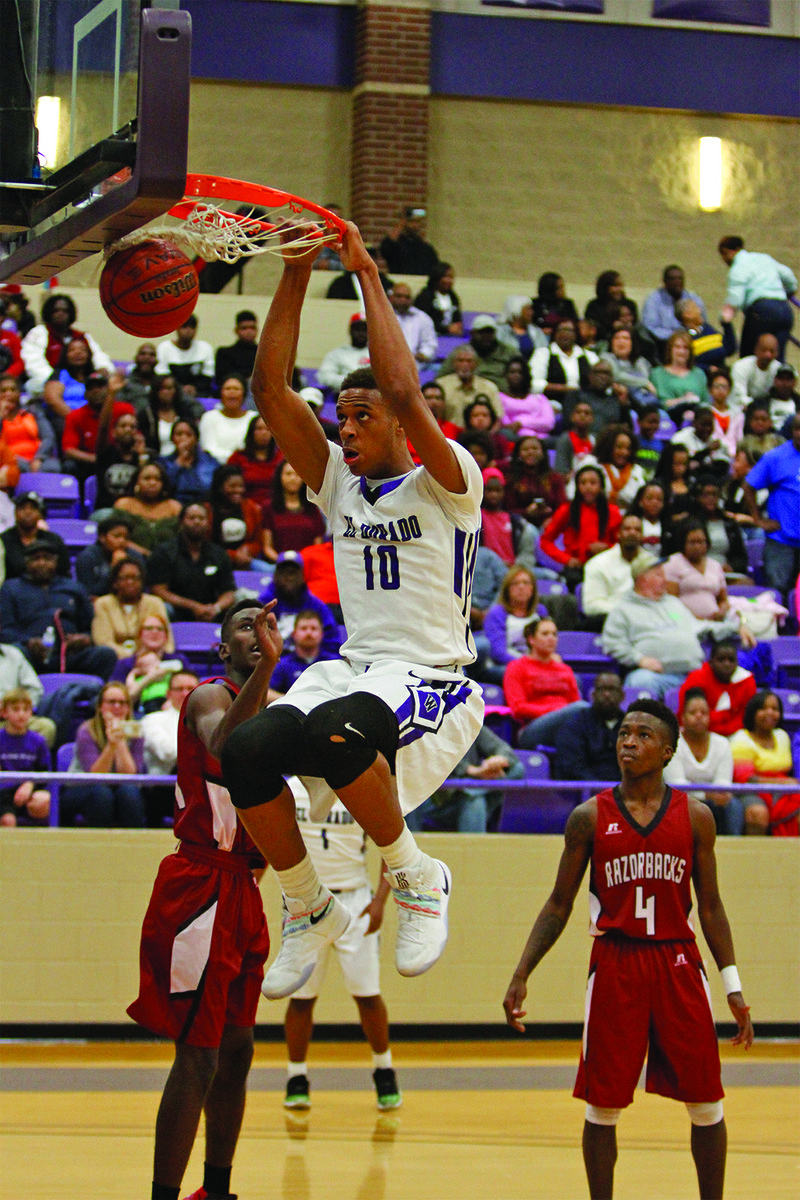 El Dorado's Daniel Gafford throws down a two-hand dunk against Texarkana. The Wildcats beat the Razorbacks 91-78 Saturday night to win the 6A-West Conference Tournament title at Wildcat Arena. Gafford, a University of Arkansas signee, totaled 34 points and 26 rebounds for the Wildcats.