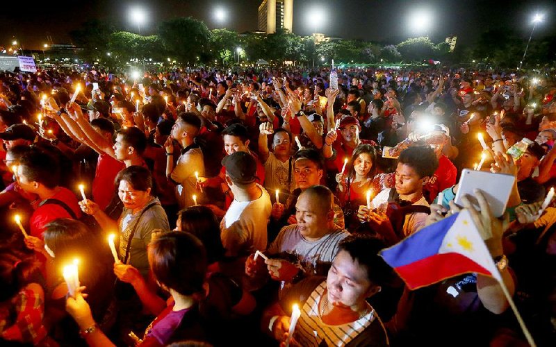 Filipinos in Manila show their support Saturday for President Rodrigo Duterte’s war on drugs, as the nation also celebrated the anniversary of former dictator Ferdinand Marcos’ ouster.