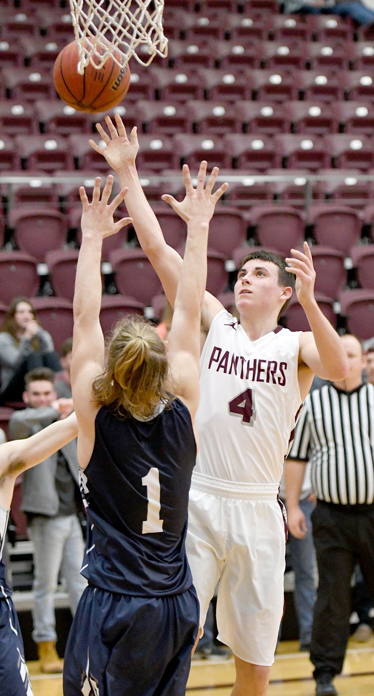 Bud Sullins/Special to Siloam Sunday Siloam Springs senior Charlie Jones, right, scored 16 points, but the Panthers saw their season end Tuesday with a 63-52 loss to Greenwood in a 6A-West Conference Tournament game played at the Panther Activity Center.