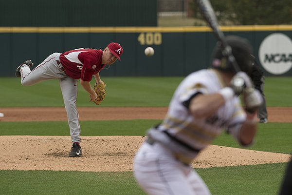 Arkansas' Barrett Loseke throws a pitch to Bryant's James Ciliento on Sunday, Feb. 23, 2017, at Baum Stadium in Fayetteville.
