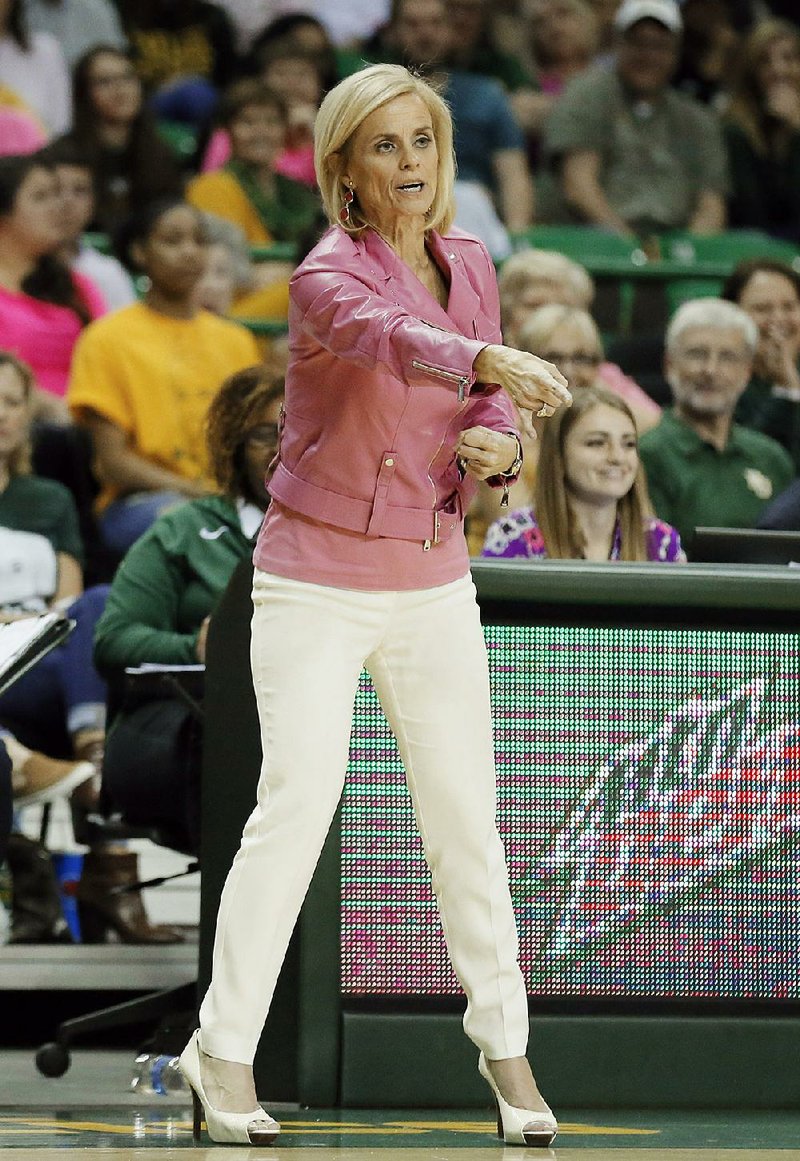 Baylor head coach Kim Mulkey instructs her team in the second half of an NCAA college basketball game against Oklahoma State on Saturday, Feb. 18, 2017, in Waco, Texas. 