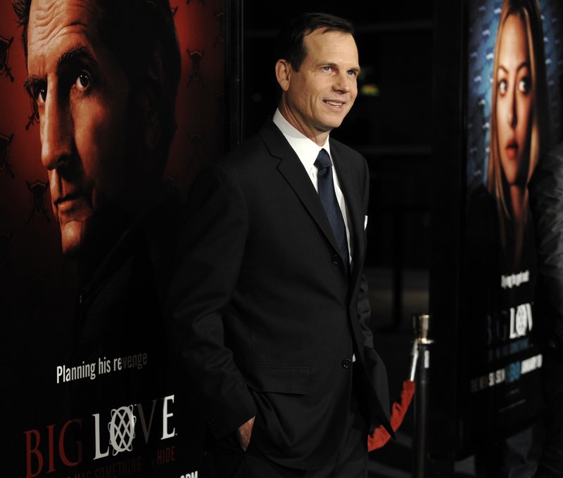 FILE - In this Wednesday, Jan. 14, 2009, file photo, Bill Paxton, a cast member in the HBO series "Big Love" poses at the show's third season premiere in Los Angeles. 