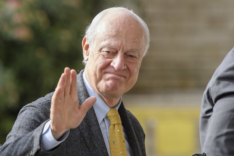 UN Special Envoy for Syria Staffan de Mistura waves as he arrives for Syria peace talks with Syria's main opposition High Negotiations Committee, HNC, at the European headquarters of the United Nations in Geneva, Switzerland, Sunday, Feb. 26, 2017. 