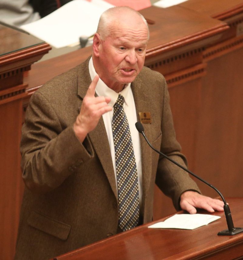 Rep. Gary Deffenbaugh, R-Van Buren, speaks Monday against Senate Bill 284, which would allow grocery stores to sell all brands of wine. The bill failed to gain approval in the House.