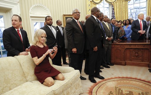 President Donald Trump, right, meets with leaders of historically black colleges and universities in the Oval Office of the White House in Washington, on Monday, Feb. 27, 2017. Also at the meeting are White House Chief of Staff Reince Priebus, left, and Counselor to the President Kellyanne Conway, on the couch.