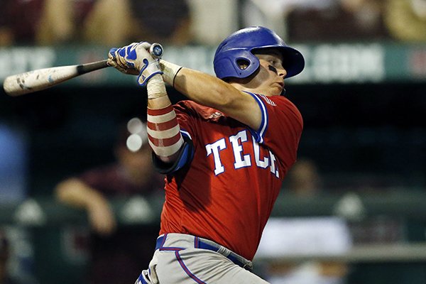 Louisiana Tech's Jordan Washam swings and misses a Mississippi State pitch during their NCAA Regional Baseball Tournament championship game at Dudy Noble Field in Starkville, Miss., Sunday, June 5, 2016. (AP Photo/Rogelio V. Solis)