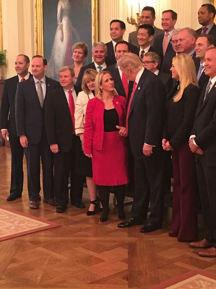 Arkansas Attorney General Leslie Rutledge poses with President Donald Trump and attorneys general from other states on Feb. 28, 2017, at the White House. 