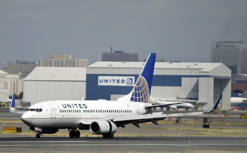 A United Airlines jet lands at Newark Liberty International Airport in Newark, N.J., in this file photo. The airline said it plans to add more flights from key airports this summer. 