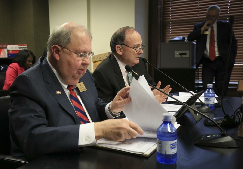 Rep. Steve Hollowell (left) and Sen. Ron Caldwell discuss in a committee meeting Tuesday their bill that would merge Crowley’s Ridge Technical Institute and East Arkansas Community College.