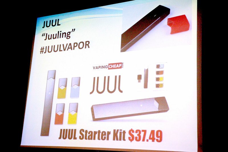 LYNN KUTTER ENTERPRISE-LEADER E-cigarettes was one of the topics discussed at a forum on alcohol and drug use last week in Prairie Grove. This slide in the presentation shows how some e-cigarettes look like flash drives. The use of e-cigarettes has many names, such as &quot;Juuling,&quot; shown above, modding and dripping.