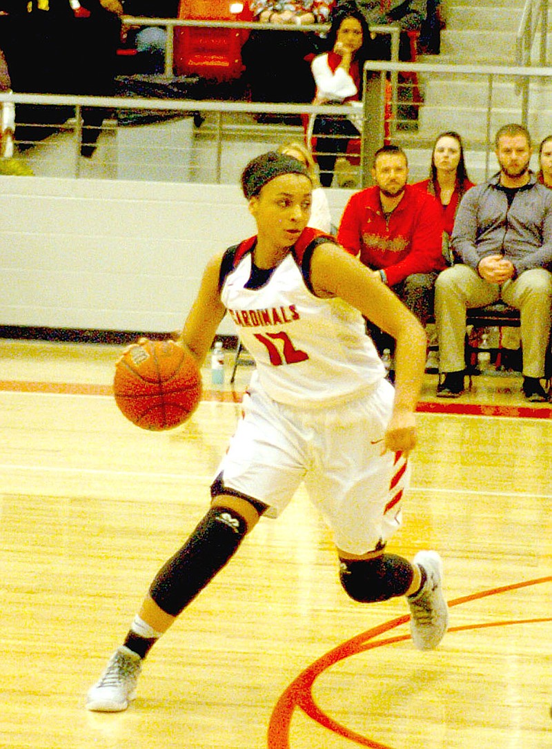Photo by Mark Humphrey/Enterprise-Leader/Farmington senior forward Kaylee Brown, shown playing in Cardinal Arena, has been a steady contributor this year. She helped the Lady Cardinals earn a trip to state this week with a third place finish at the 5A West Conference tournament held last week at Greenbrier.