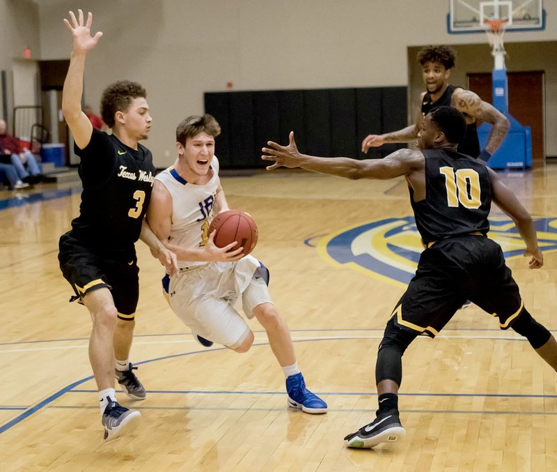 Photo courtesy of JBU Sports Information John Brown University senior Zach English, middle, was named to the Sooner Athletic Conference&#8217;s third team, the league announced on Tuesday.