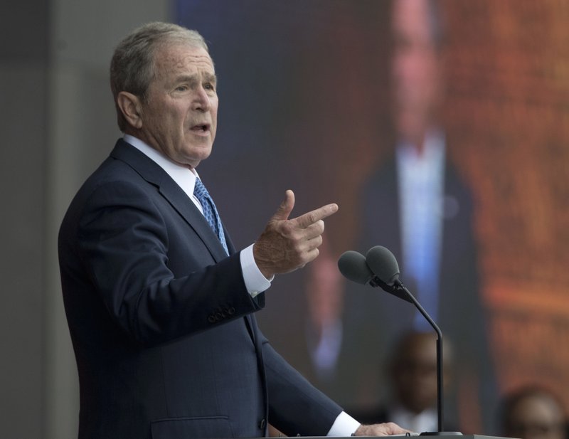 FILE - In this Sept. 24, 2016 file photo, former President George W. Bush speaks in Washington. Bush said Monday, Feb. 27, 2017, &quot;we all need answers&quot; on the extent of contact between President Donald Trump's team and the Russian government, and he defended the media's role in keeping world leaders in check. (AP Photo/Manuel Balce Ceneta, File)