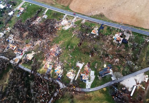 Debris marks the spots Wednesday, March 1, 2017, where Tuesday's tornado destroyed homes in Perryville, Mo. 
