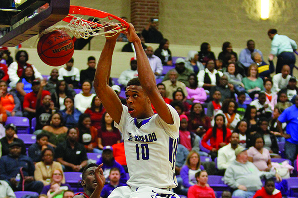 El Dorado's Daniel Gafford throws down a two-hand dunk against Texarkana on Saturday, Feb. 26, 2017, at Wildcat Arena in El Dorado. The Wildcats beat the Razorbacks 91-78 as Gafford totaled 34 points and 26 rebounds.