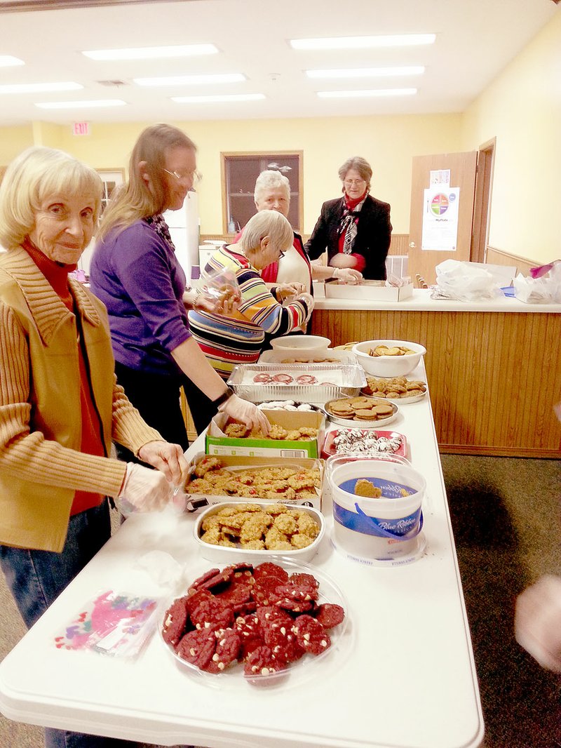 Members of the Noel Woman&#8217;s Club bag cookies for the Meals on Wheels program.