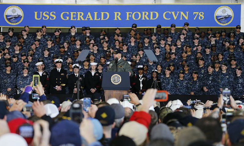 President Donald Trump speaks Thursday to Navy and shipyard personnel aboard the nuclear aircraft carrier Gerald R. Ford at Newport News Shipbuilding in Newport News, Va.