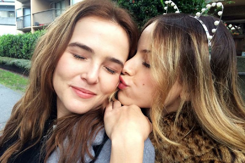 Sam (Zoey Deutch) and Lindsay (Halston Sage) are trapped in a time loop that forces them to continually relive the worst day ever in Before I Fall.