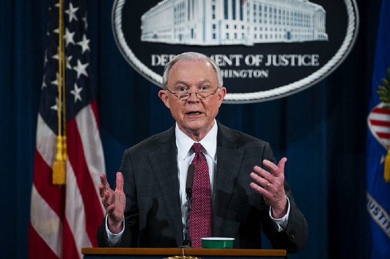 Attorney General Jeff Sessions speaks Thursday during a news conference at the Department of Justice in Washington. Sessions announced his recusal from overseeing an investigation into contacts between the Trump campaign and the Russian government.
