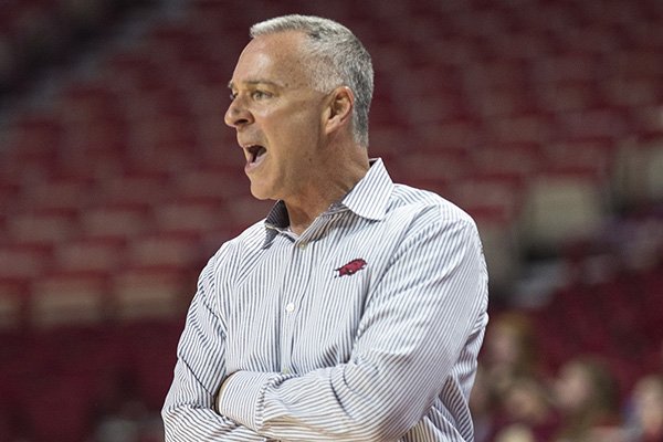 Arkansas coach Jimmy Dykes watches during a game against Auburn on Sunday, Feb. 26, 2017, in Fayetteville.