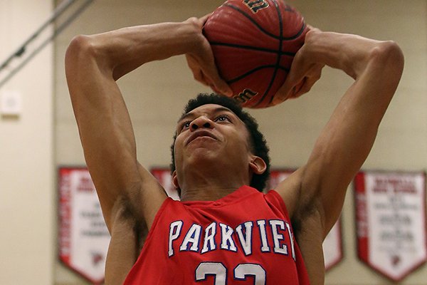 Parkview's Ethan Henderson goes for a dunk during the first period of a game against Maumelle on Friday, Jan. 20, 2017, in Maumelle.