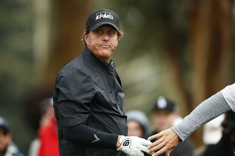 Phil Mickelson had to call on his brother Tim to caddie for him during Friday’s second round of the Mexico Championship after Jim Mackay was forced to leave early because of a stomach virus.